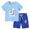 Camiseta infantil 2022 TikTok verano nueva ropa infantil de comercio exterior coreana pantalones cortos de manga corta para niños traje de dos piezas
