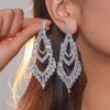 Nueva joyería europea y americana sentido de alta gama súper flash diamantes completos aretes largos temperamento de lujo para mujer aretes de novia al por mayor
