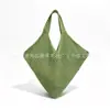 Nueva bolsa tejida terminada ~ Nueva bolsa tejida estilo perezoso estilo coreano 2026, bolsa calada para sesiones de fotos de vacaciones con un sentido de ambiente