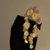 Pendientes largos de borla de metal de lujo, ligeros y retro, de nicho, exquisitos, de moda, con temperamento, joyería de oído de alto sentido, al por mayor