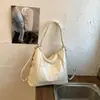 Bolsa de dumplings de gran capacidad para mujer, nuevo diseño de nicho vintage 2026, bolso de hombro cruzado, mochila multifuncional