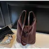 Bolso Cubo de Temperamento Retro a la Moda para Mujer Otoño 2026 Nuevo Bolso Tote Versátil de Gran Capacidad para Hombro Cruzado Bolso Pequeño