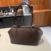 Bolsa Feminina Transfronteiriça Couro de Vaca Camada Superior Bolsa Tote de Ombro Design Bowling para o Dia a Dia Moda Preguiçosa Bolsa Casual Portátil Feminina