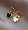 Aço titânio corpo inteiro estilo europeu e americano dupla face preto e branco concha natural amor luxo leve alto nível versátil exportação transfronteiriça explosão geração