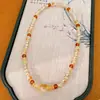 Pulseira empilhada de contas de vidro e pedra olho de tigre, sensação de luxo leve de nicho de alta qualidade, acessório de pulso versátil casual Maillard