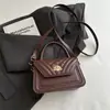 Bolsa Feminina Minimalista Retrô 2026 Outono Novo Estilo Elegante Texturizada de Ombro Sob o Braço Moda para o Dia a Dia Bolsa de Mão