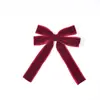 Nuevo colgante de decoración para fiesta de Navidad con lazo rojo brillante transfronterizo, adorno colgante de lazo con ambiente festivo