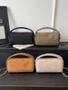 Bolso de mano simple estilo coreano para mujer, nuevo de la primavera 2026, vintage, diario, casual, con textura, para hombro y cruzado