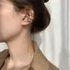 Pendientes Minimalistas de Círculo Plateados Clip-On para Mujer, Diseño Versátil y Único, Clavos de Oreja de Lujo Ligero