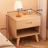 Mesita de noche de madera maciza para dormitorio del hogar 2026 Venta caliente Creativa Pequeño Armario de almacenamiento simple para niños Mesita de noche de tronco