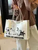 Bolsa de Lona Grande com Desenho Animado para Mulheres 2025 Nova Bolsa de Ombro Casual Tote Bag Bolsa Tote para Estudante Aula Trabalho Roupas