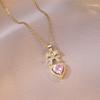 Collar con colgante de corazón de melocotón elegante con lazo de circonita rosa de moda para mujer, estilo europeo y americano transfronterizo