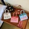 Mini bolso infantil transfronterizo, estilo coreano, lindo, moderno, de alta gama, nicho y bolso ligero de lujo estilo Kelly para niñas
