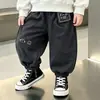 Ropa Exterior de Primavera y Otoño para Niños con Estampado de Dibujos Animados, Pantalones Casuales Sueltos Estilosos Estilo Coreano para Niños, Pantalones de Bebé, Venta al por Mayor para Comercio Exterior