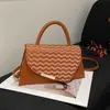 Moda Verão 2026 Estiloso Tendência Casual Texturizado Simples Chique Bolsa de Ombro Único Transversal de Mão Pequena Quadrada