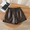 Pantalones Cortos de Cuero PU con Cintura Elástica para Mujer de Cintura Alta Otoño e Invierno Nuevos PU Holgados Versátiles de Moda Pierna Ancha Ropa de Exterior Moldeadores de Glúteos