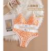 Conjunto de ropa interior sexy con estampado de leopardo francés transfronterizo, copa triangular de escote profundo, espalda de belleza, sin aro de acero, para comercio exterior