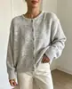 Bestseller transfronterizo europeo y americano: cárdigan de punto suave de color liso para mujer, abrigo suéter mullido de un solo pecho con cuello redondo para otoño e invierno