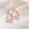 Pendientes de Aro Dorados Sencillos de Acero de Titanio Versátiles de Bobina Redonda con Hebilla de Oreja Microincrustada Pendientes de Circonita Fabricante Entrega Directa