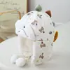 Nuevo sombrero Lei Feng para niños con protección para los oídos, sombrero cálido de estilo coreano con dibujos animados de dinosaurios lindos para invierno, producto transfronterizo para niños