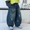 Pantalones Vaqueros Curvos para Niños Primavera y Otoño Estilo Coreano Infantiles Guapos Sueltos Casuales Pantalones con Estilo para Bebé Comercio Exterior