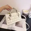 Bolso cuadrado pequeño, simple, moderno y único, bolso de hombro nuevo y de moda con textura, bolso cruzado simple de estilo coreano para mujer, verano 2026