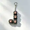 Chaveiro Botão Luminoso de Patinha de Gato Chave de Teclado Switch Tecla de Teclado Brinquedo Descompressão Pingente de Bolsa Chaveiro