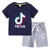 Camiseta infantil 2022 TikTok verano nueva ropa infantil de comercio exterior coreana pantalones cortos de manga corta para niños traje de dos piezas