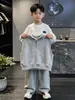 Conjunto de sudadera para niño 2026 nuevo primavera y otoño ropa deportiva grande para niños chaleco con capucha conjunto de tres piezas para niños moda casual