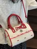 2025 Nuevo Estilo de Verano Dulce Femenino Corazón Bolso Boston Rosa Lazo Nicho Viajero Hombro Cruzado Bolso de Mano
