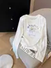 Camiseta de algodón de manga larga para mujer, modelo 2026, con cuello redondo, corte regular y estampado de copos de nieve, moderna y elegante, top rejuvenecedor, perfecta como capa base para el otoño