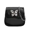 Bolso Pequeño Texturizado Transfronterizo para Mujer, Nuevo Modelo Verano 2026, Bolso Cruzado Mini para Labial, Bolso de Hombro con Cadena de Mariposa Simple y Elegante