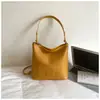 Bolso Cubo Casual de Moda de Nicho de Shuai Mi con Textura Simple, Nuevo Modelo 2026 Bolso Cruzado de Hombro para Mujer