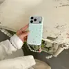 Funda de teléfono colorida de estilo coreano con cadena de estrellas nueva para Apple 17Promax, adecuada para 16Promax, doble capa 15pro18pro