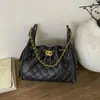 Bolso de mujer transfronterizo con un toque de lujo ligero, bolso de mano pequeño acolchado con cadena estilo Chanel, bolso tote de gran capacidad, moderno