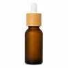 En Stock 15ml 20ml 30ml 50ml Botellas para Aceites Esenciales con Anillo de Madera de Nogal Botellas Gotero de Vidrio de Grado Alimenticio Venta al por Mayor Capacidad Pequeña