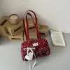 Bolso de hombro y axila de lunares de moda transfronteriza de nicho para mujer, nuevo bolso de mano para commuting 2026, bolso Boston, bolso almohada