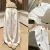 Calça feminina de algodão e linho branca, estilo terno, com corte curvo, modelo novo verão 2026, cintura alta, solta, casual, relaxada, calça de linho de perna larga