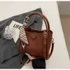 Bolso de Mano Retro Transfronterizo para Mujer 2025 Otoño e Invierno Nuevo Bolso de Hombro de Moda para Salir Bolso Cruzado Tipo Cubo Versátil