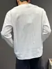 Camiseta casual versátil de jacquard simple, cuello redondo, manga larga, color liso, corte holgado, capa base, top texturizado adelgazante