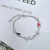 Electrochapado en oro real circón microincrustado temperamento joyería de mano femenina diseño de nicho sentido pulsera de amor de doble capa Fábrica de origen