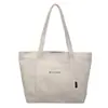 Bolsa de Lona com Letras Coreanas para Mulheres 2026 Nova Tendência Moda Estilo Universitário Bolsa Tote Grande Capacidade Bolsa de Ombro