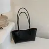 Bolso de Mano con Colgante para Mujer Otoño Invierno Versátil Moda Madre-Hija 2026 Bolso para el Trabajo Nuevo Simple Un Solo Hombro Debajo del Brazo