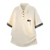 Ropa Masculina Acu Decoración de Bolsillo a Cuadros Solapa Manga Corta Hombre Verano 2026 Casual Transpirable Ajuste Holgado Camisa Polo para Hombre
