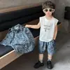 Traje de Verano de Manga Corta para Niños 2026 Nuevo Fresco y Elegante Camisa con Estampado de Leopardo Conjunto de Tres Piezas de Manga Corta para Niños y Bebés