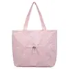 Bolso de hombro de lunares frescos estilo japonés 2026 nuevo modelo bolsa de mano casual de gran capacidad bolsa de compras simple y moderna para mujer