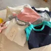 Camiseta de Manga Larga Infantil T2026 Ojos Bizcos Otoño Nuevas Llegadas Unisex Bordado Sencillo Manga Larga Camiseta Color Bloque Bebé Mangas Raglán