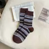 Medias a rayas de otoño e invierno calcetines a rayas de imitación de piel de visón vintage estilo coreano calcetines peludos de tubo medio de color contrastante