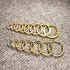 Cobre de Alta Calidad en Stock Suministro Directo Llaveros de Latón Llaveros de Cobre Accesorios de Cuero para Bricolaje Anillos Lisos Llaveros Colgantes