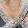 Diseño de nicho sentido de alta gama pendientes de borla con lentejuelas metálicas para mujer moda de lujo ligero combinan con todo nuevos pendientes de moda 2025